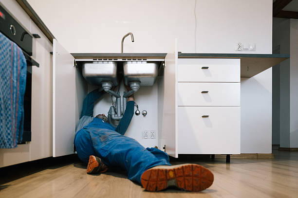 Professional Drain Cleaning technician working in Yelm, WA